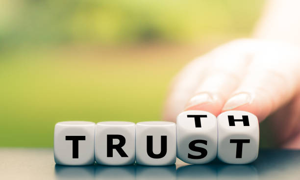 istock Truth instead of trust. Hand turns dice and changes the word 