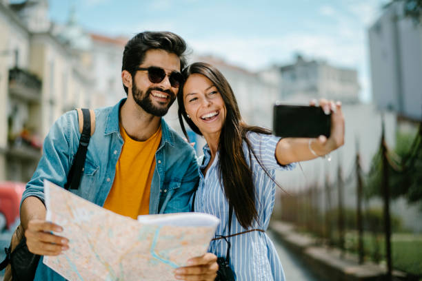 istock Happy couple exploring stock photo 1203716249