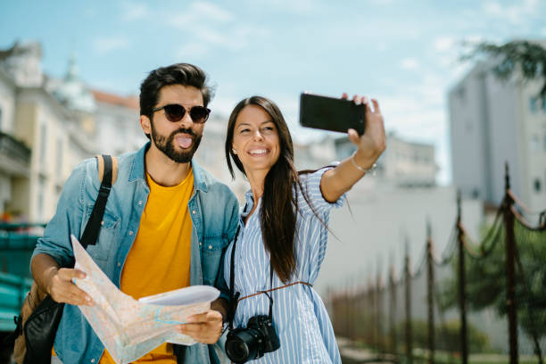 istock Happy couple exploring stock photo 1203716300