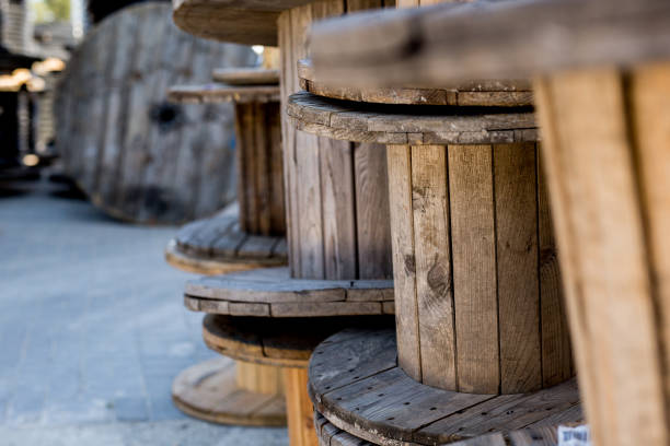 Close up shot of some big empty cable reels. Close up shot of some big empty cable reels. wooden spool stock pictures, royalty-free photos & images