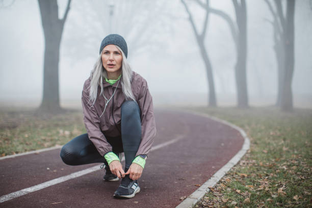 istock Exercising at foggy day 1203717611