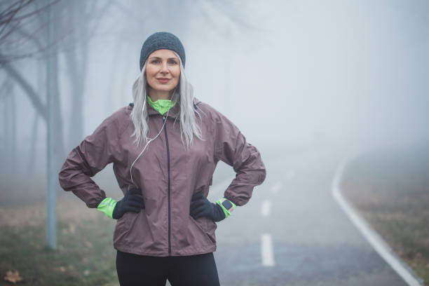 istock Exercising at foggy day 1203717679