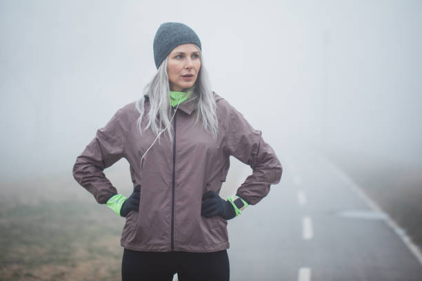 istock Exercising at foggy day 1203717735