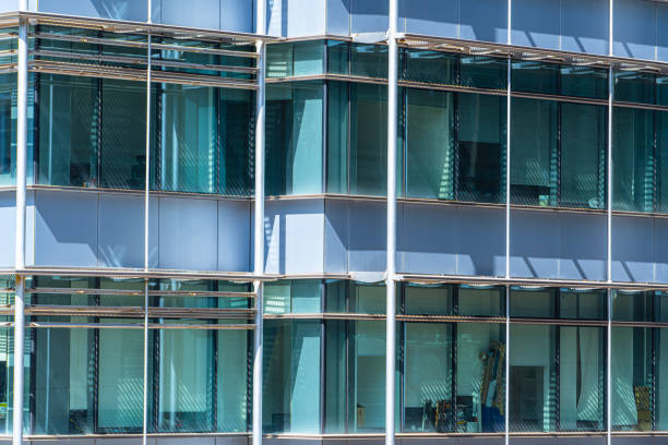 istock Windows. The glass facade of the building 1203717818