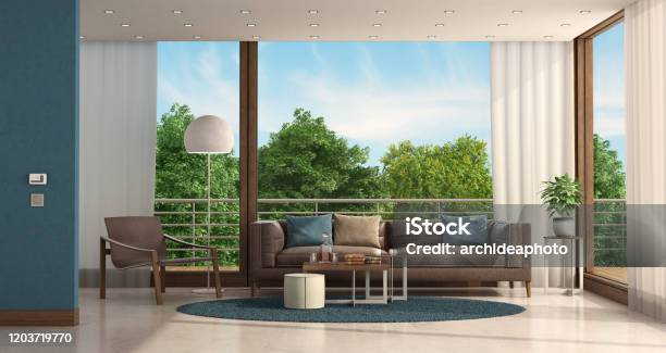 Minimalist Living Room Of A Modern Villa With Leather Furnishings Stock Photo - Download Image Now