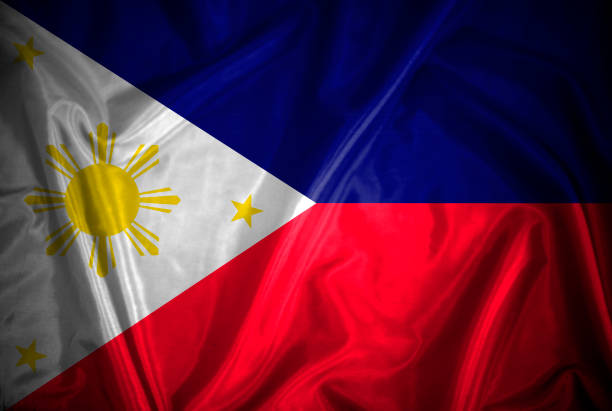 istock Philippines flag on fabric, waving in the wind. 1203720550