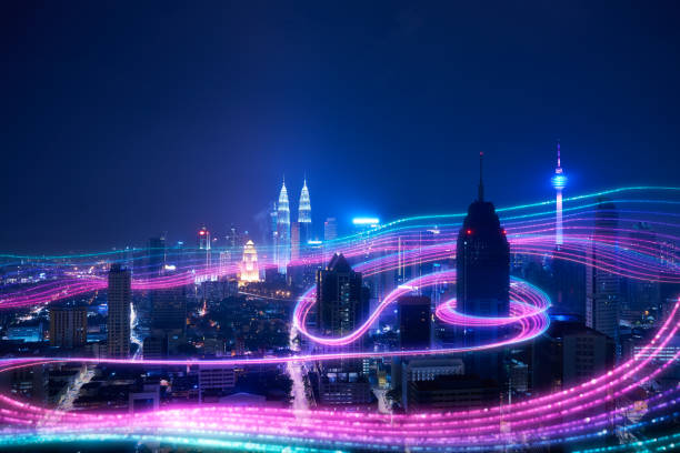 Smart city big data connection technology concept . Night city and abstract with gradient blue and red glowing light trail surround the city ,Smart city big data connection technology concept . malaysia stock pictures, royalty-free photos & images