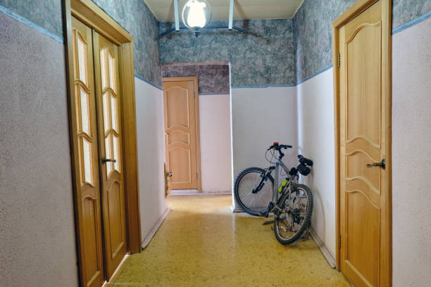 istock Long corridor in the apartment with a bicycle 1203720973