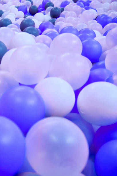 istock Background of blue and white plastic balls, close-up 1203721185