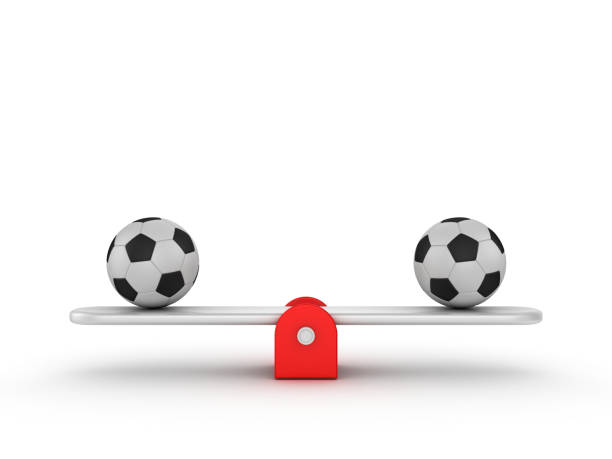 istock Seesaw Scale with Soccer Balls - 3D Rendering 1203724208