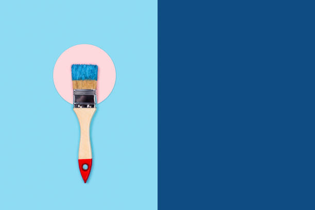 istock Blue background with paint brush and circle. 1203725121
