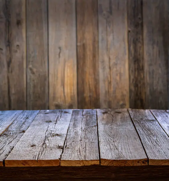 Rustic wooden table board and wall background