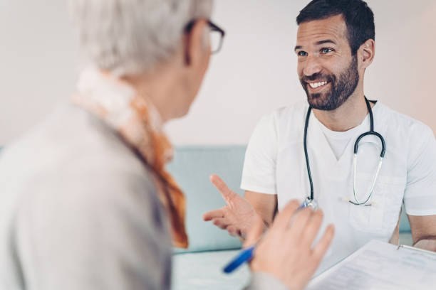 istock Doctor talking to a patient 1203727158