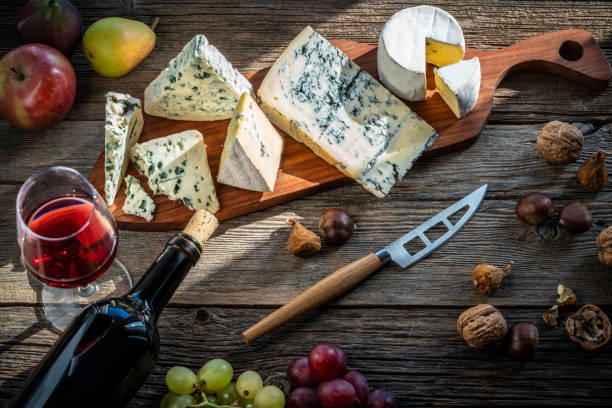 istock Blue cheese and red wine in cutting board 1203727496