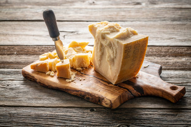 Parmesan Reggiano cheese on cutting board