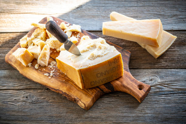 istock Parmesan Reggiano cheese on cutting board 1203727689