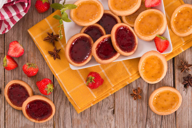 istock Lemon and straberry tartlets. 1203728901