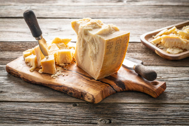 istock Parmesan Reggiano cheese on cutting board 1203729766