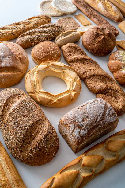 grupo de pão variado em branco - carbohydrate artisan bread isolated on white isolated - fotografias e filmes do acervo