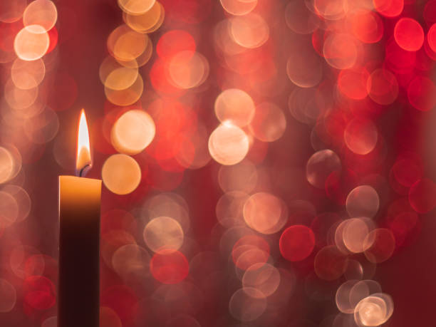 Candle with glitter background