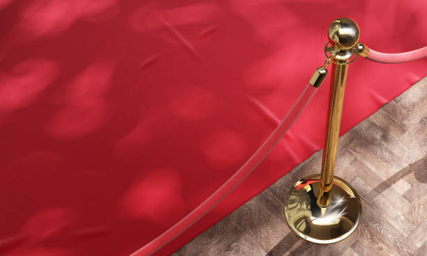 Red event carpet and golden barrier with red rope