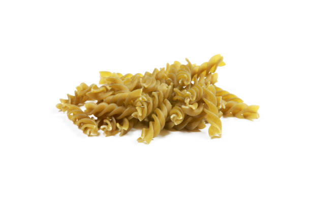 istock Raw Durum Wheat Green Fusilli Pasta on white background 1203740803