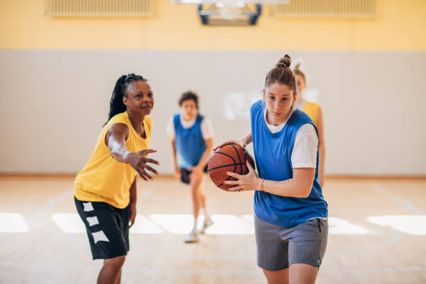 istock Basketball team practicing on basketball court 1203742023