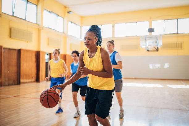 istock Basketball team practicing on basketball court 1203742087