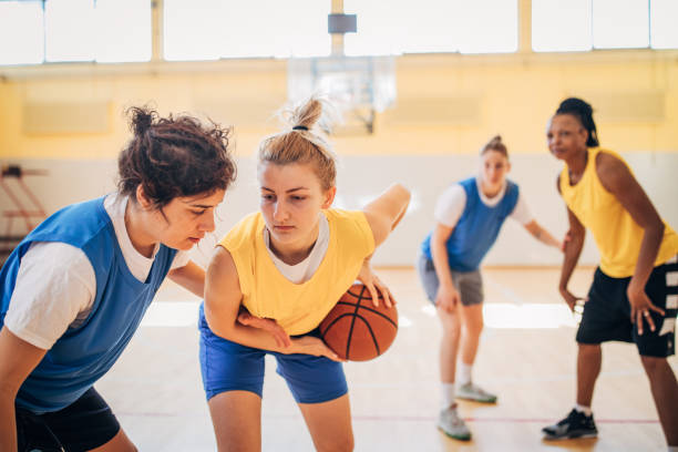 istock Basketball team practicing on basketball court 1203742245