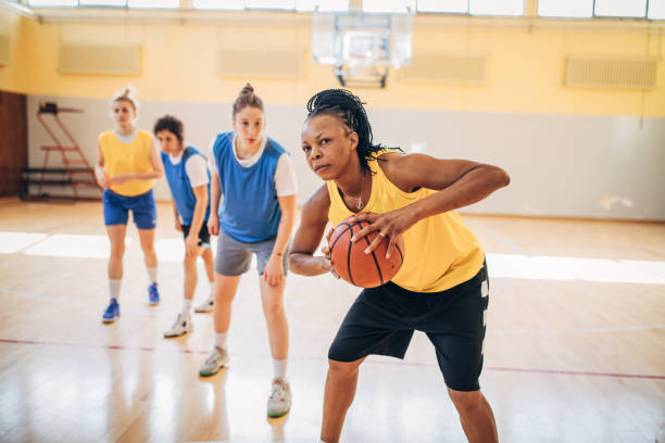 istock Basketball team practicing on basketball court 1203742269