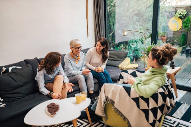 istock Happy multi-generational family gathering at modern home. 1203743907