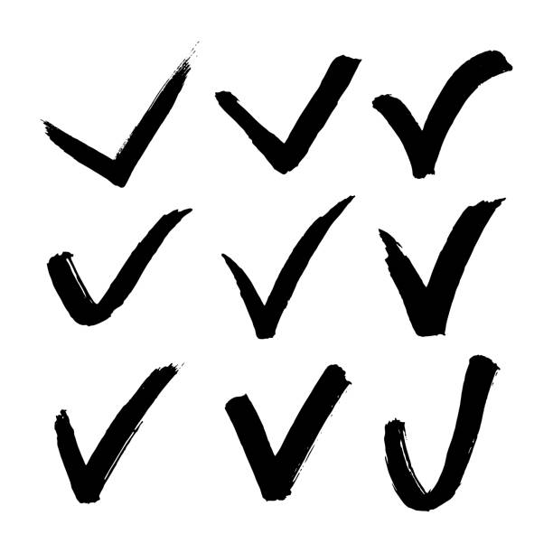 istock Check Mark symbol set. Tick or Confirm sign black brush stroke hand drawn collection. 1203744289