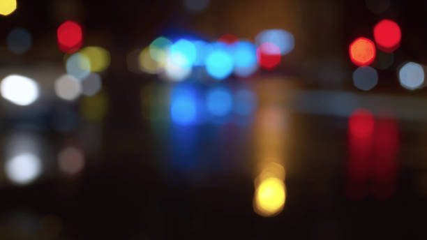 istock Bokeh night city traffic lights. Rainy 1203745303