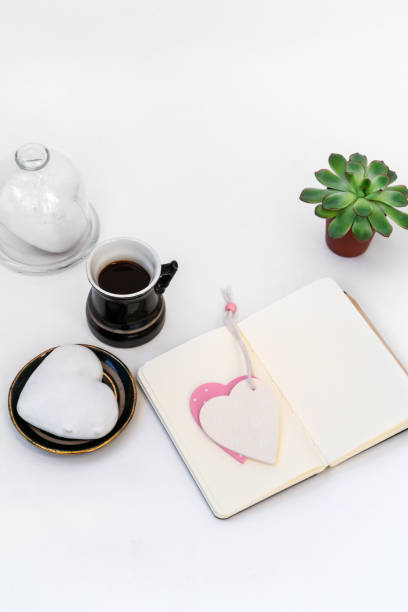 istock Valentine's Day composition. Female desktop with cup of coffee 1203747071