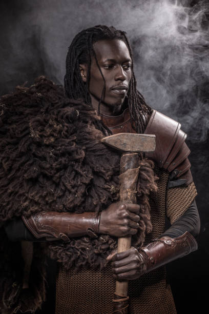istock Smoky Weapon wielding viking inspired black warrior 1203748051