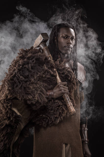 istock Smoky Weapon wielding viking inspired black warrior 1203748320
