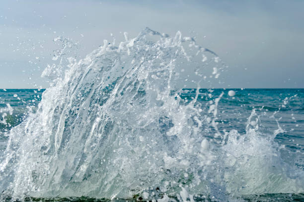 Splashing wave on the Black sea in the day.