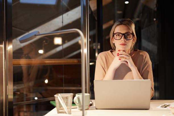 istock Businesswoman with laptop at office 1203753330