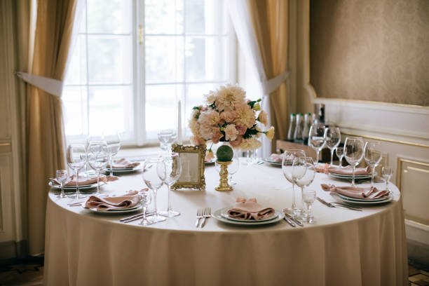 istock Elegant table set up for a romantic dinner. Wedding reception, catering 1203753615