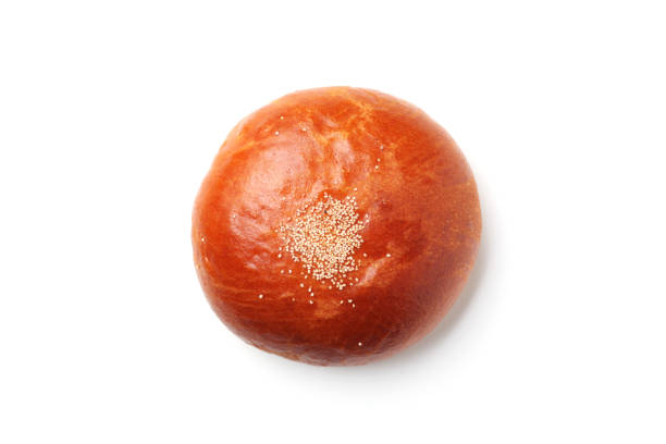 istock anpan round bread with azuki red beans paste closeup isolated on white background 1203755971