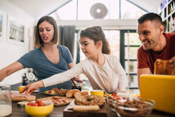 istock Nice breakfast for a happy family 1203756052