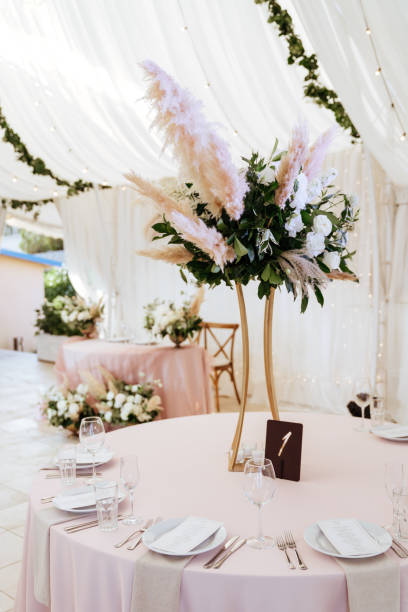 istock Wedding flowers decoration in the restaurant 1203761918