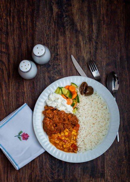 istock Indian food on white plate 1203762469