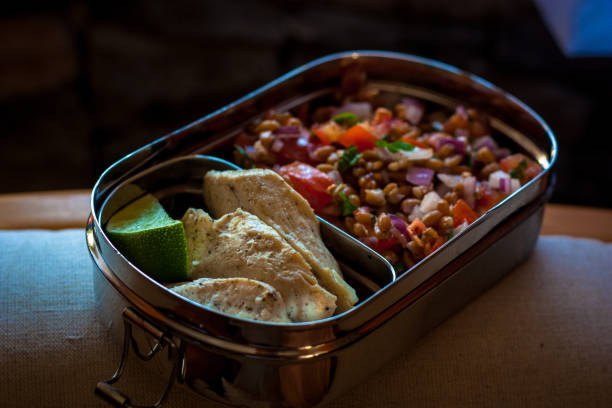 istock Lunchbox with lentil salad and grill chicken breast 1203762635