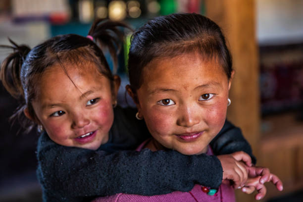istock Two Tibetan young girls, Upper Mustang, Nepal 1203763139