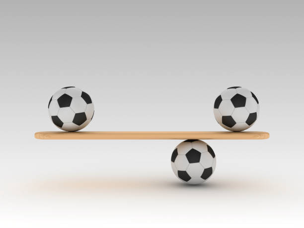 istock Seesaw Scale with Soccer Balls - 3D Rendering 1203765871