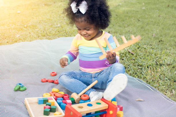 istock An african girl in backyard 1203766480