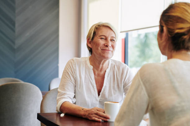 istock Mother listening to daughter 1203766851