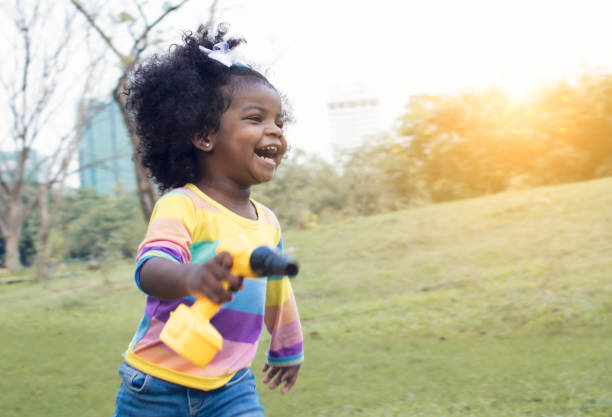 istock An african girl in backyard 1203767050