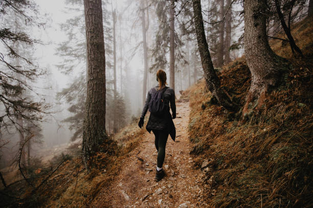 istock Woman hiking in the Dolomites 1203771415